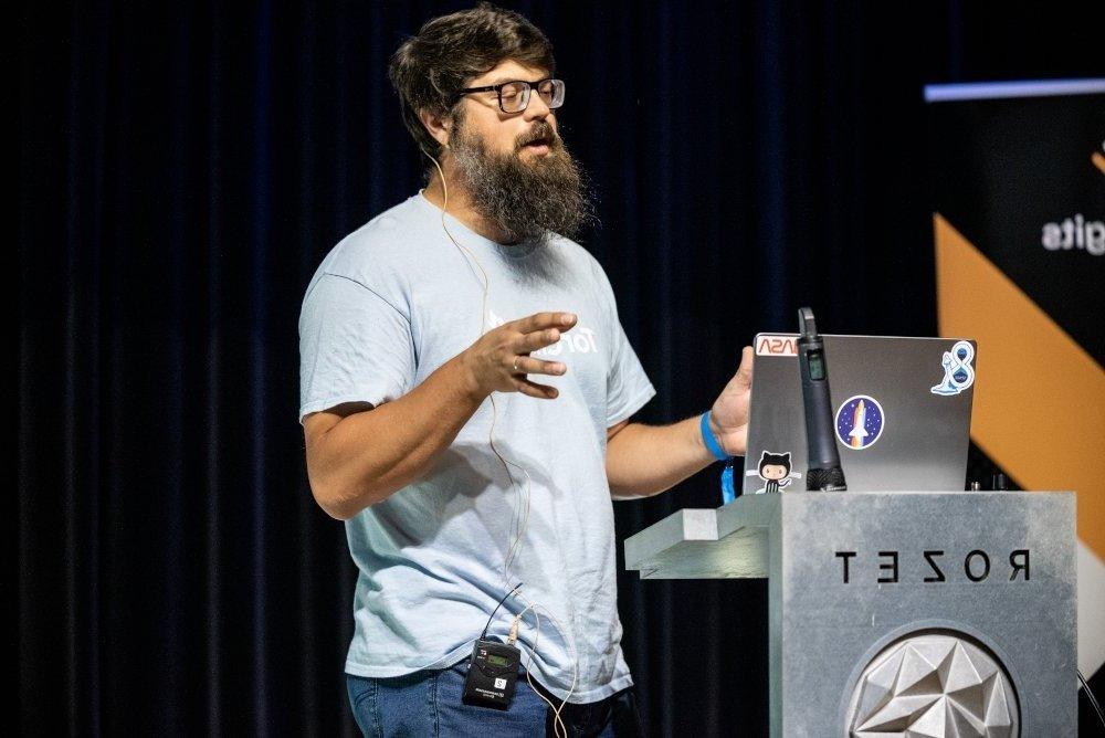 people in the audience, watching the stage